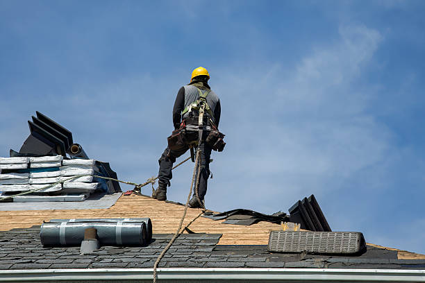 Professional Gutter Installation technician working in South Easton, MA